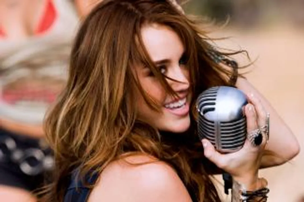 Can We Guess Your Age by Your Go-To Karaoke Song? Miley Cyrus, Party In The U.S.A.