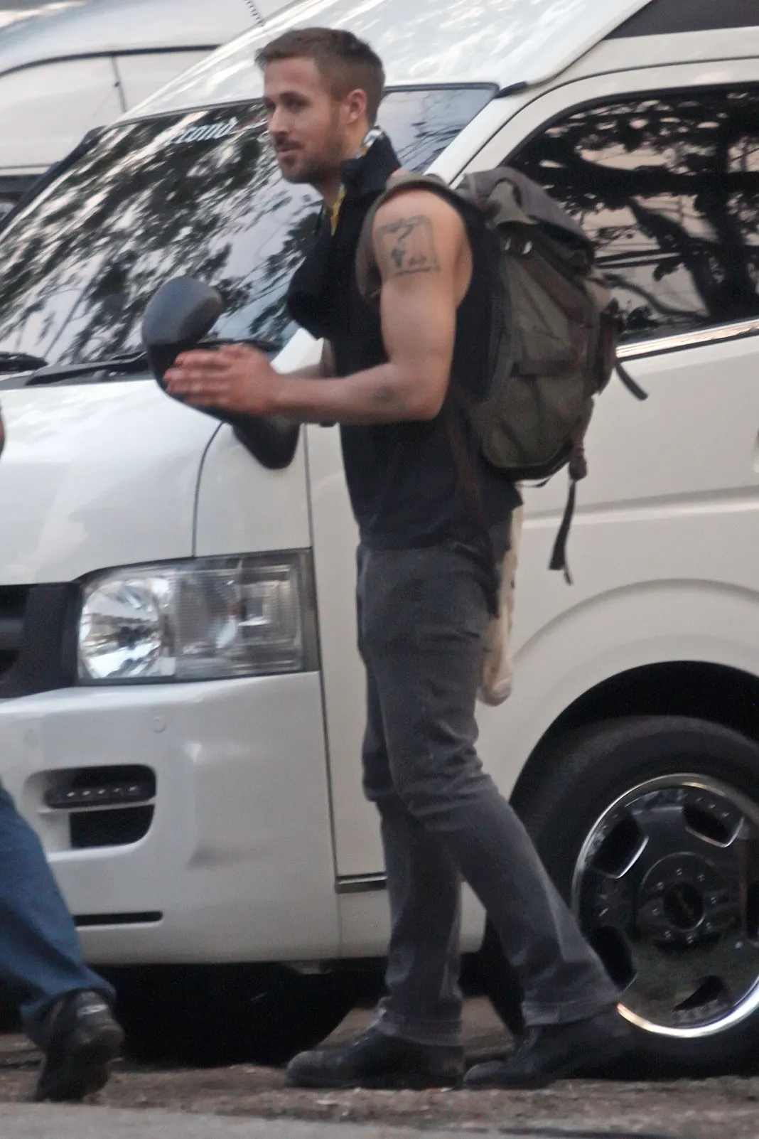 gosling holding a puppy gratuitous gosling gallery tank tops edition gosling holding a puppy gratuitous gosling gallery tank tops edition