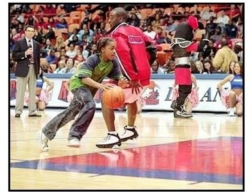 Like Mike movie still: Young Calvin Cambridge (Lil Bow Wow) displays some amazing hoop skills as he outplays Los Angeles Knights superstar Tracy Reynolds (morris Chestnut) - much to the amusement of K Like Mike movie still: Young Calvin Cambridge (Lil Bow Wow) displays some amazing hoop skills as he outplays Los Angeles Knights superstar Tracy Reynolds (morris Chestnut) - much to the amusement of K